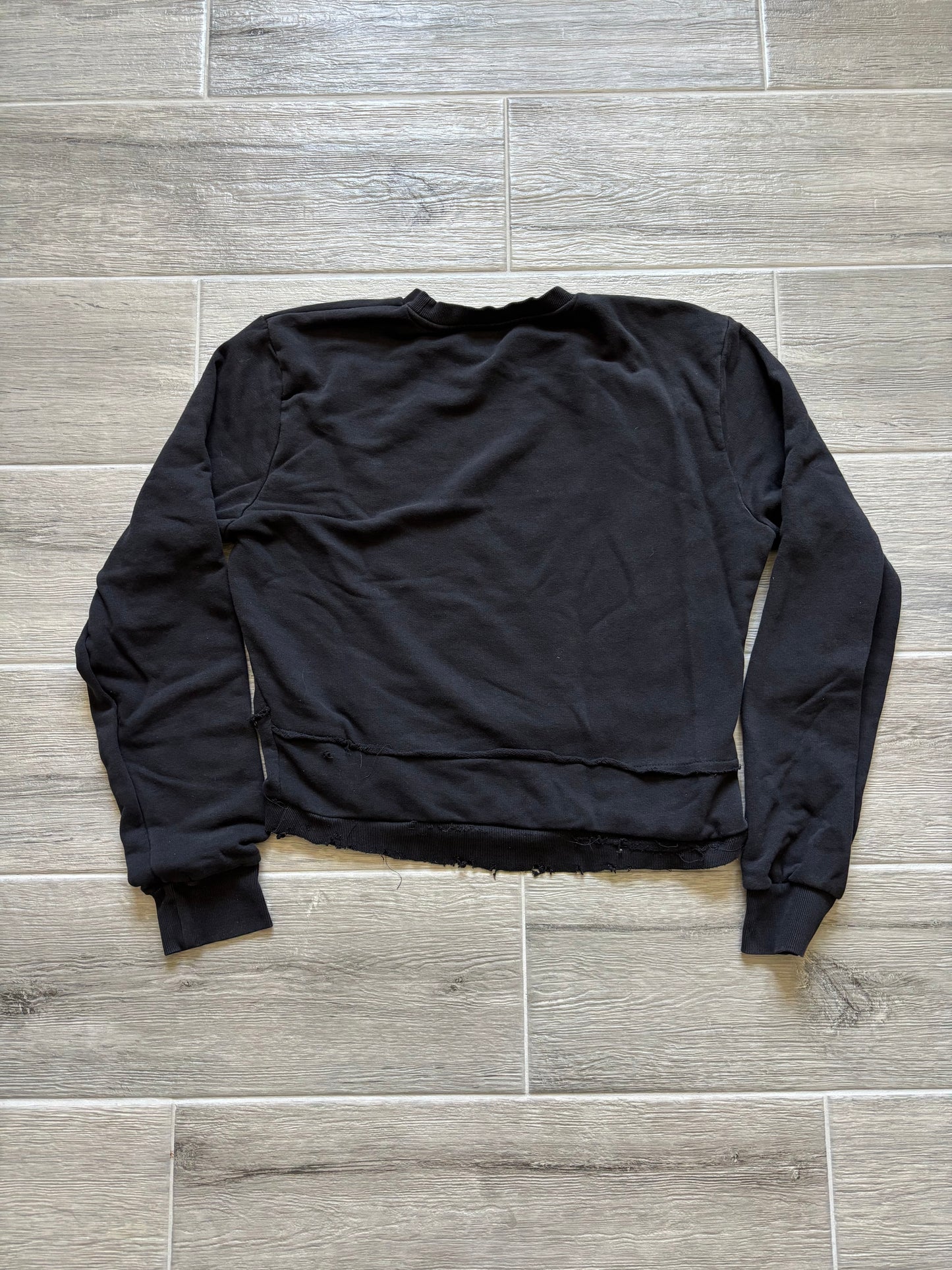 Distressed $tar Sweater